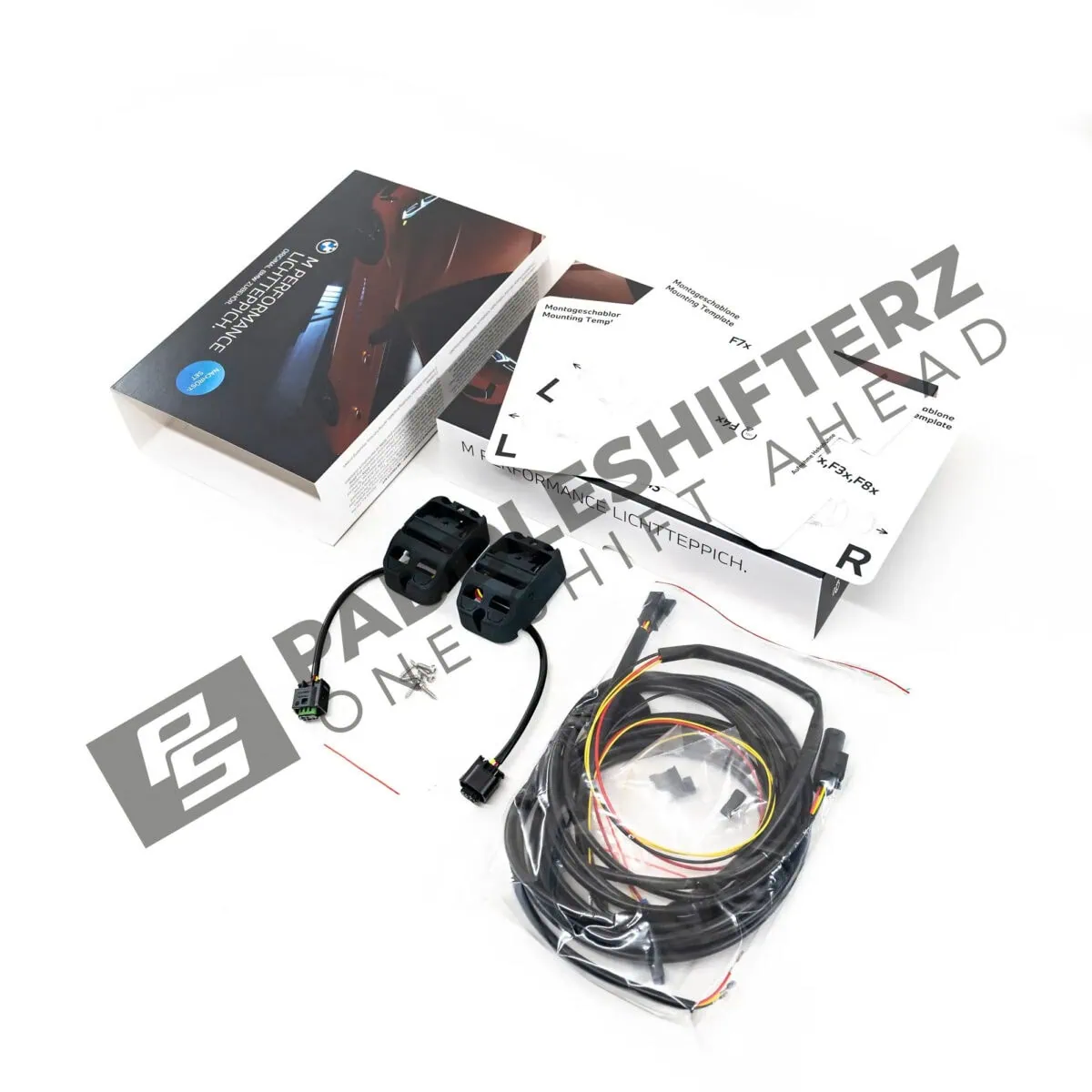 OEM BMW M Performance Light Carpet retrofit kit 63175B61FE1 box unpacked side viw